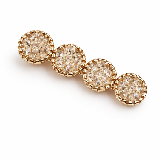 Gold earring with four round diamonds on a white background