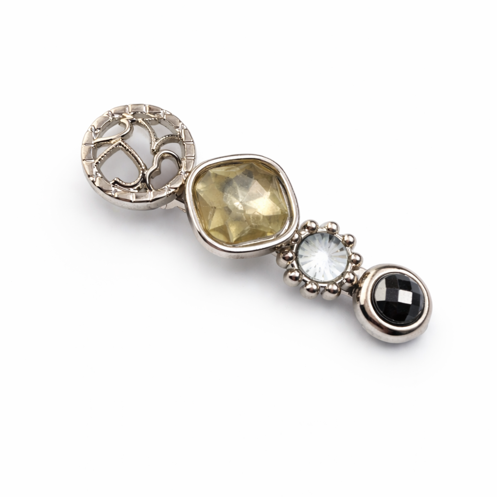 Jewelry pendant with multicolored gemstones on a white background