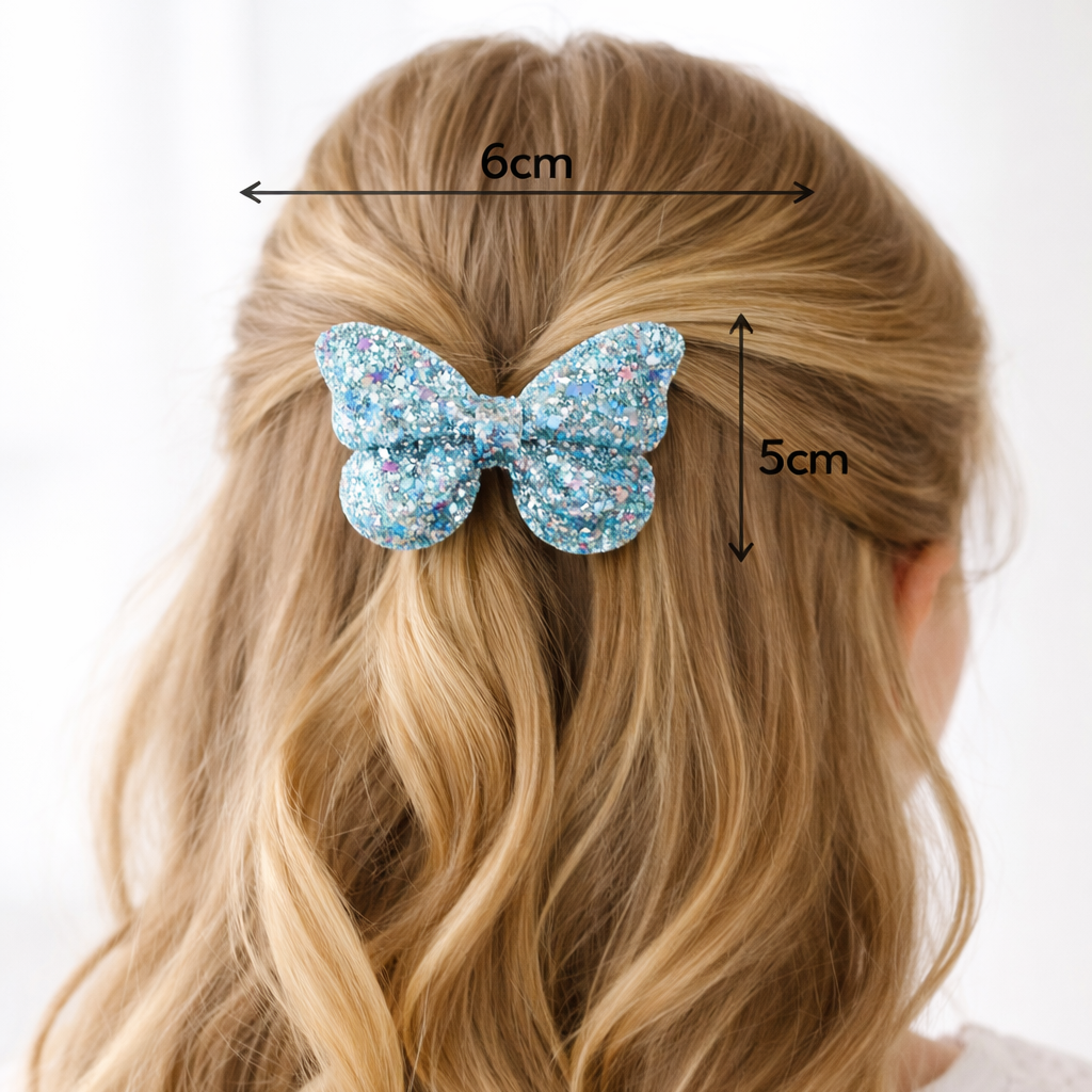 Blue butterfly hair clip on wavy blonde hair with measurements indicated