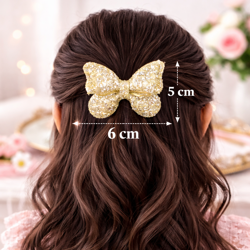 Gold butterfly hair clip on a child's hair with measurements indicated