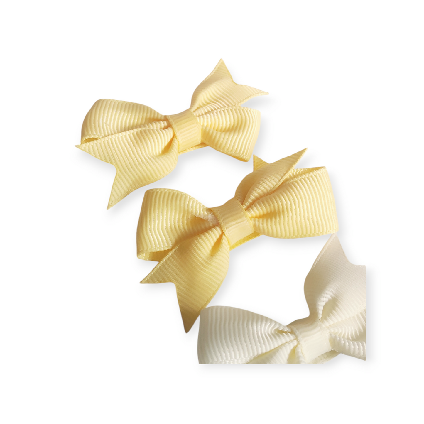 Set Of 4 Dinky Bows in Buttercup Cream