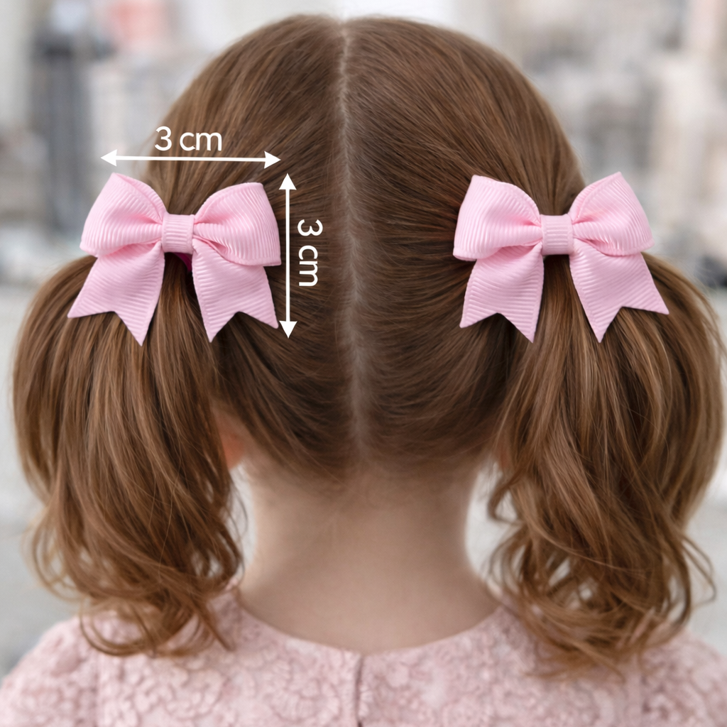 Child with pigtails wearing pink hair bows, with measurements indicated.