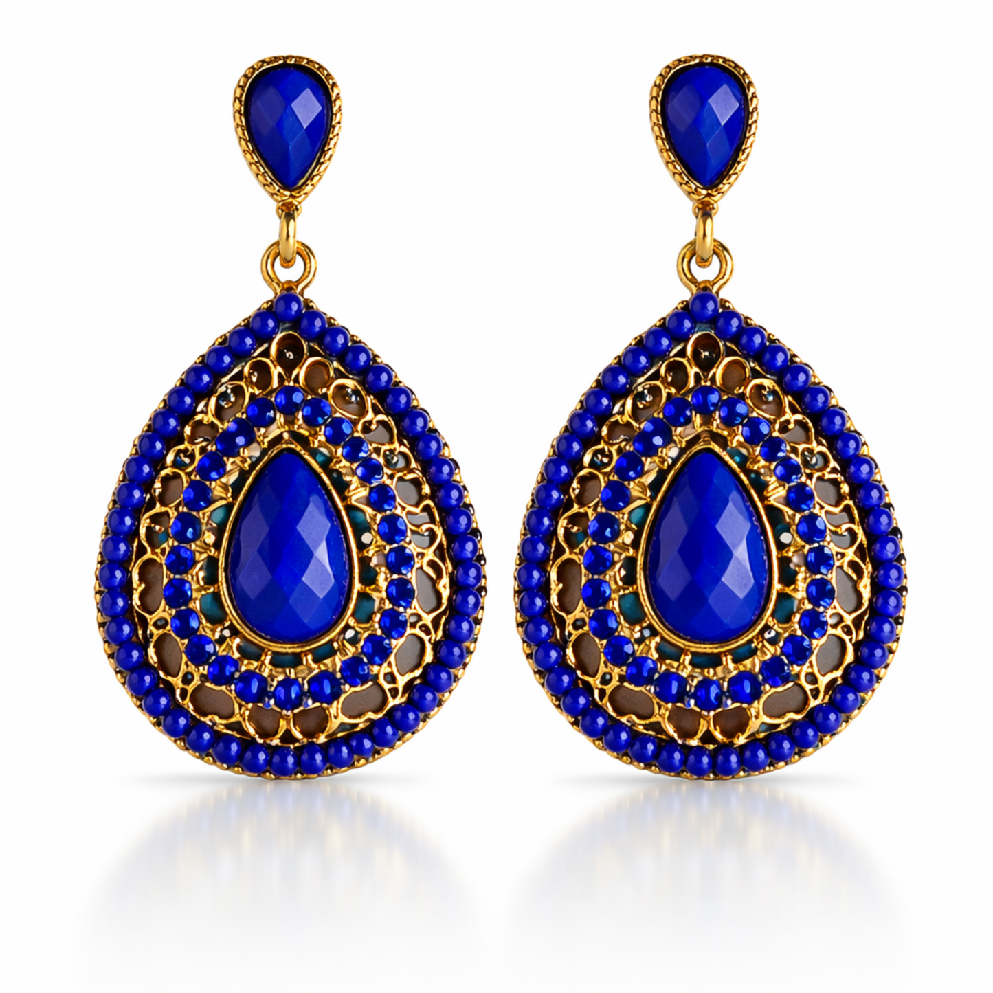 Pair of blue teardrop earrings with gold accents on a white background