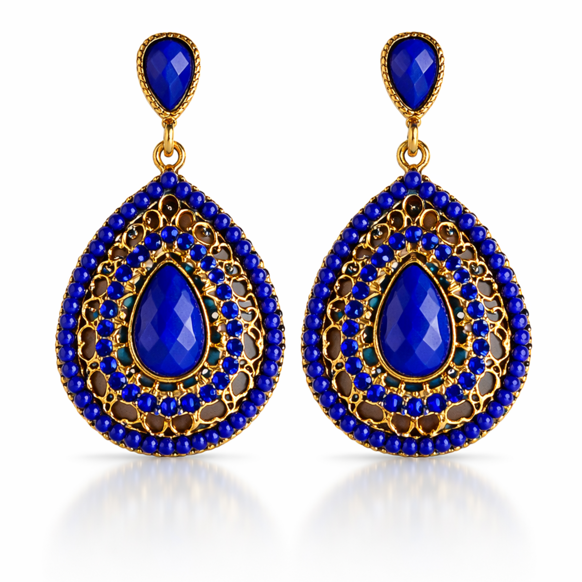 Pair of blue teardrop earrings with gold accents on a white background