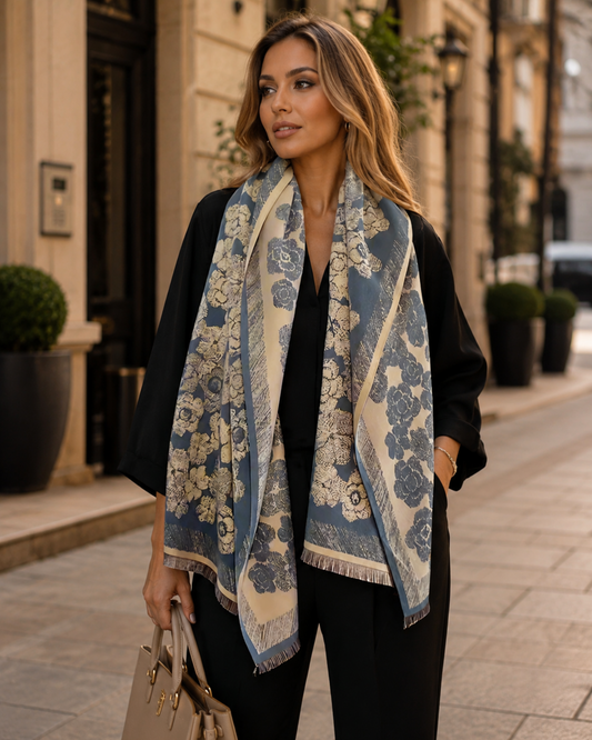 Woman wearing a blue floral scarf on a city street