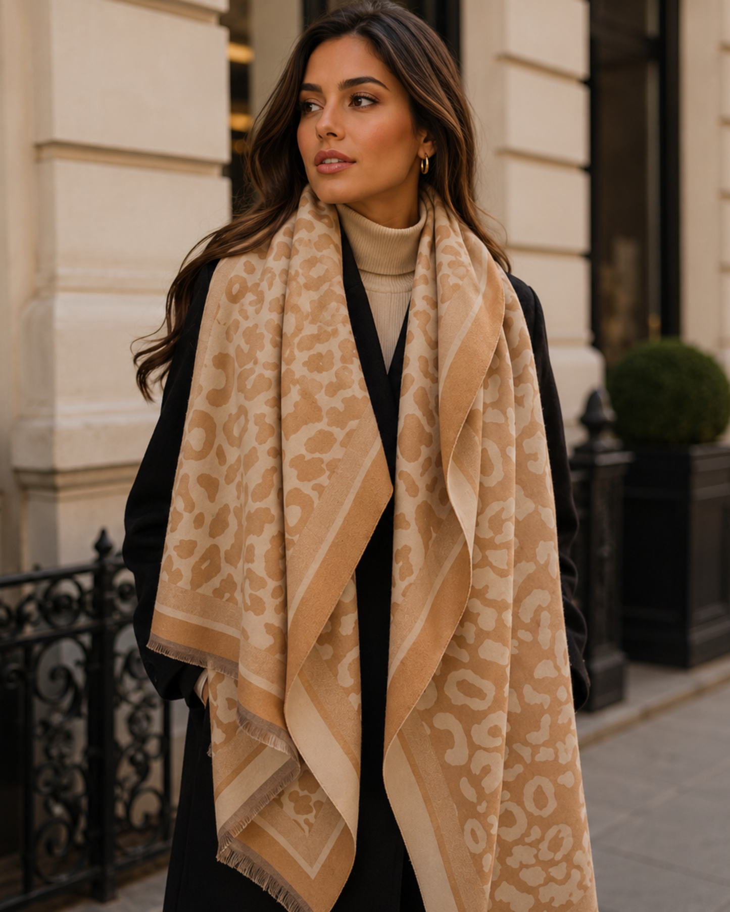 Woman wearing a patterned scarf in an urban setting