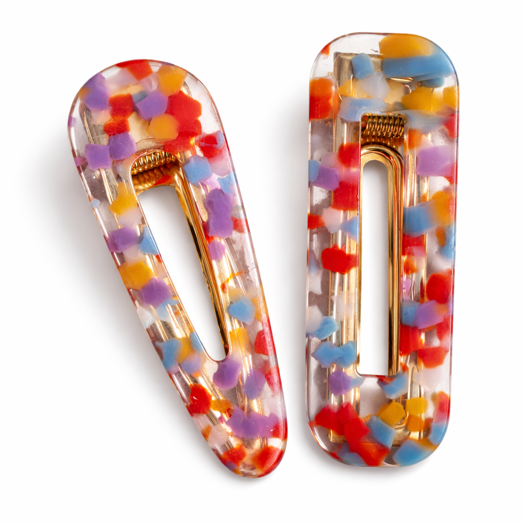 Colorful hair clips with a white background