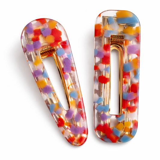 Colorful hair clips with a white background