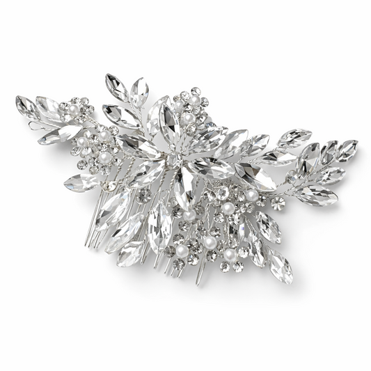 Silver leaf-shaped earring with clear crystals on a white background