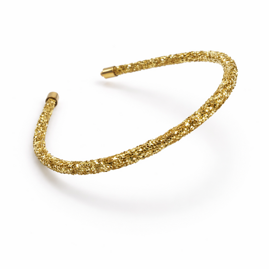 Gold headband on a white background