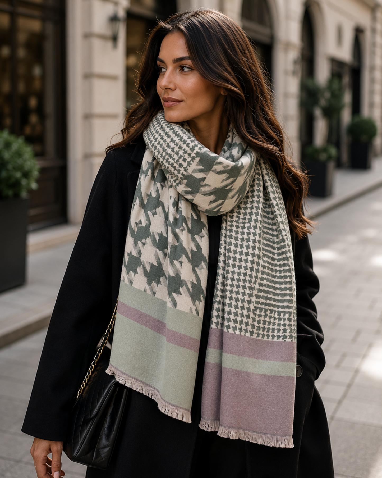 Woman wearing a patterned scarf on a city street