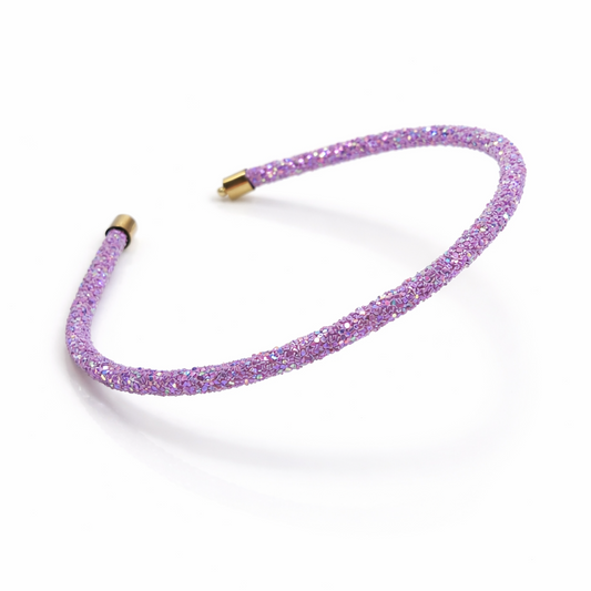 Purple beaded headband on a white background
