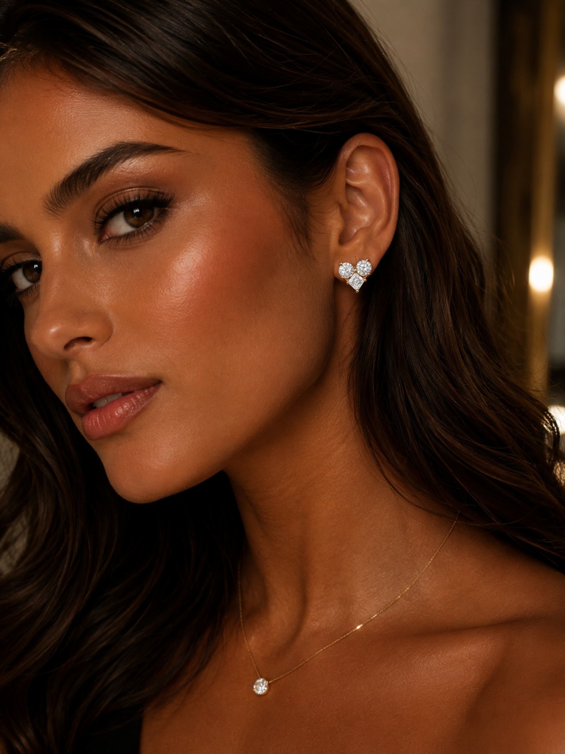 Close-up of a woman wearing heart-shaped earrings with a blurred background