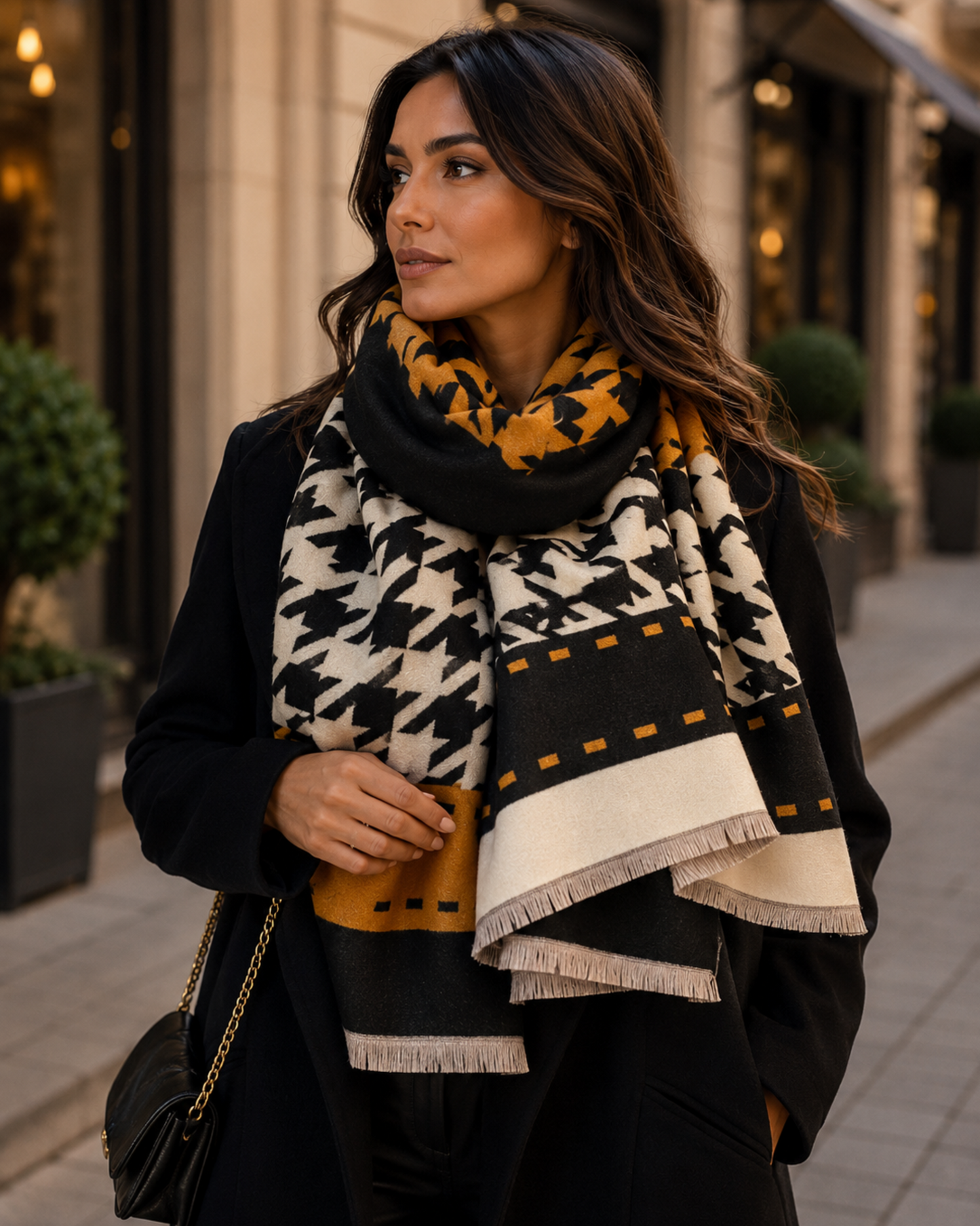 Woman wearing a patterned scarf on a city street