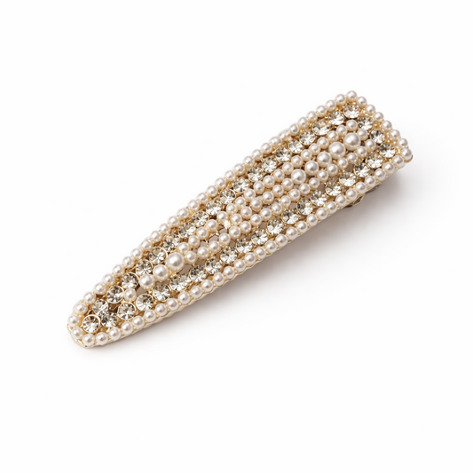 Pearl-studded hair clip on a white background
