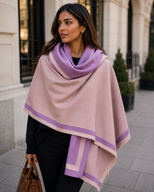 Woman wearing a pink and purple scarf in an urban setting