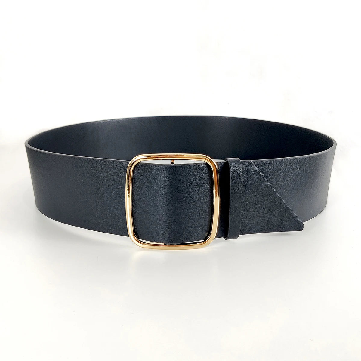 Black belt with a gold buckle on a white background